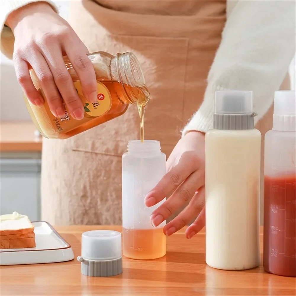 زجاجات ضغط للتوابل بخمس فتحات  - مراجعة Sauce Squeeze Bottle وسعره